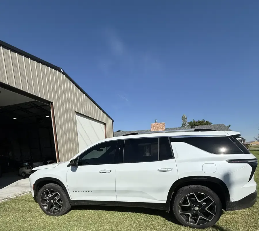 White Chevrolet Traverse RS with ceramic window tint installed by EHCO Window Tinting, Northwest Arkansas